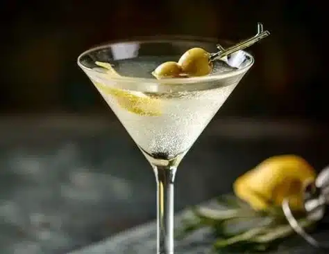 A classic Gin Martini served in a stylish glass with olive garnish.