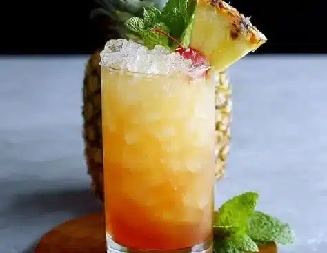 Ultimate Mai Tai cocktail garnished with mint and lime