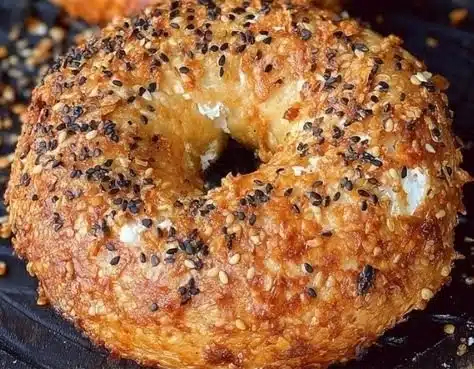Healthy cottage cheese bagels topped with seeds and herbs