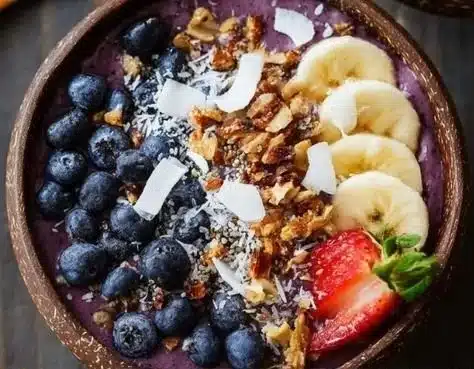 Foolproof acai bowl topped with fresh fruits and granola.